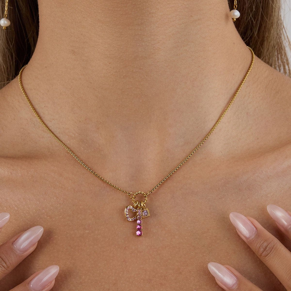 Collana cuore pink in acciaio con piccoli pendenti
