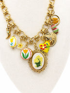 Collana Mimosa gialla in acciaio e charm pendenti