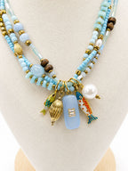 Collana Cielo in acciaio con charm pendenti